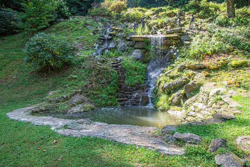 Koi pond at the base of the falls