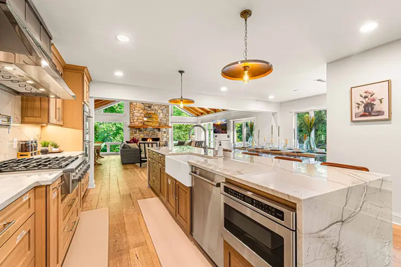 Gourmet kitchen open to both great rooms