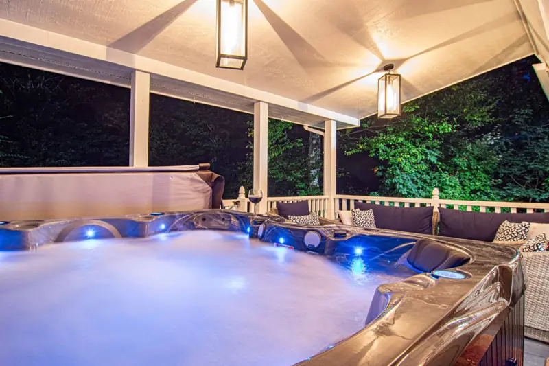 Hot tub for seven, under the covered deck